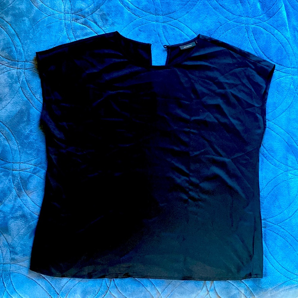 Halogen sleeveless top
